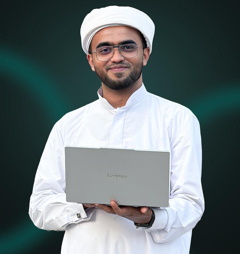 Nafih Himami Al Muhthadi holding a laptop